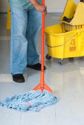 Acosta Bustamante Cleaning Pro LLC janitor mopping floor